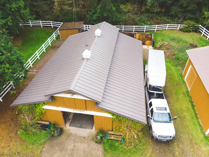 Metal roof installed on a barn and outbuilding on a Northwest property